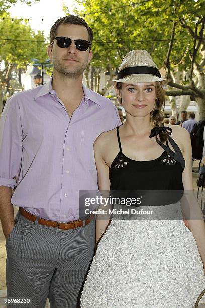 Josuha Jackson and Diane Kruger play bowling at place des Lices on May 10, 2010 in Saint-Tropez, France.