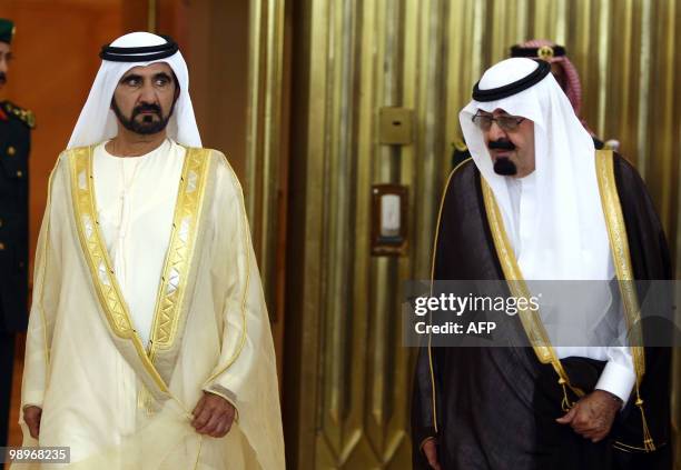 Saudi King Abdullah bin Abdul Aziz welcomes Sheikh Mohammed bin Rashed al-Maktoum, UAE's Prime Minister and Ruler of Dubai, upon his arrival to...