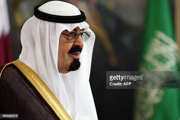 Saudi King Abdullah bin Abdul Aziz welcomes is pictured before attending a Gulf Cooperation Council advisory meeting in Riyadh on May 11, 2010. AFP...