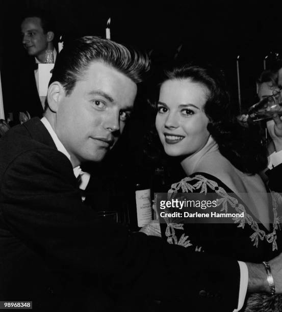 American actors Robert Wagner and Natalie Wood attend an Academy Awards party at the Beverly Hilton, circa 1957.