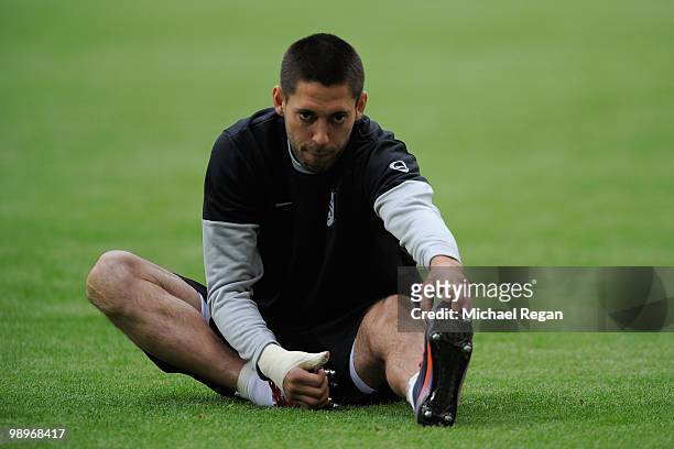 Clint Dempsey stretches during the Fulham training session ahead of the UEFA Europa League final match against Atletico Madrid at HSH Nordbank Arena...
