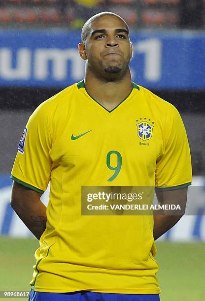 Brazil's national football team player Adriano poses for a picture before a FIFA World Cup South Africa-2010 qualifier football match against Chile...