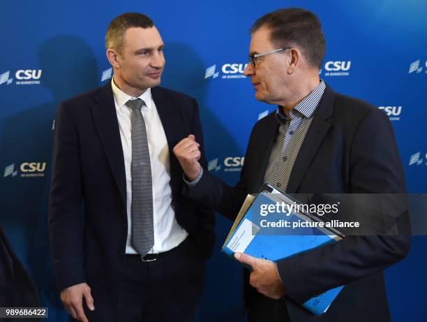 Kiev's mayor and chairman of Ukrainian government party 'Petro Poroshenko Bloc - Solidarity', Vitali Klitschko and German Minister of Economic...