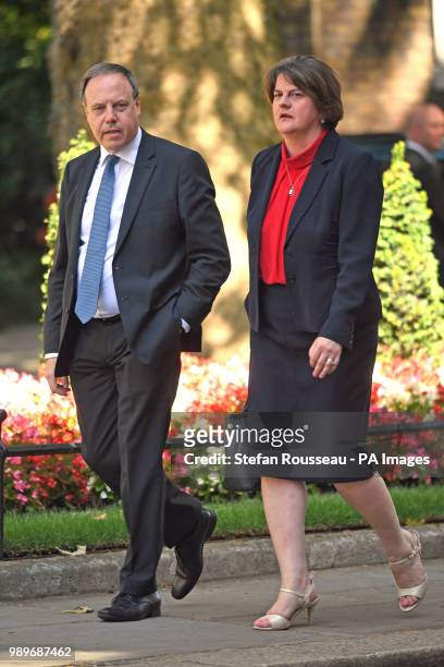 Arlene Foster, Leader of the Democratic Unionist Party, and the party's deputy leader, Nigel Dodds, arrive at Downing Street for a meeting with Prime...