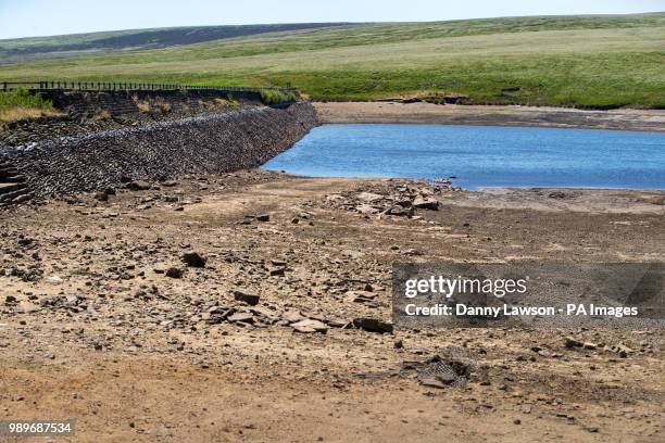 The dry banks of March Haigh reservoir near Kirklees in West Yorkshire. Parts of England could be lashed by thunderstorms and heavy rainfall as most...