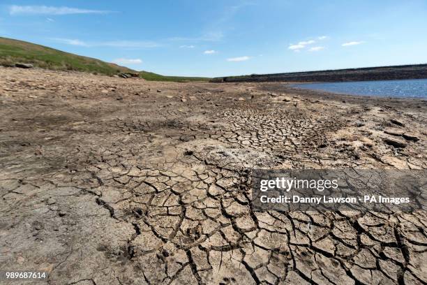 The dry banks of March Haigh reservoir near Kirklees in West Yorkshire. Parts of England could be lashed by thunderstorms and heavy rainfall as most...
