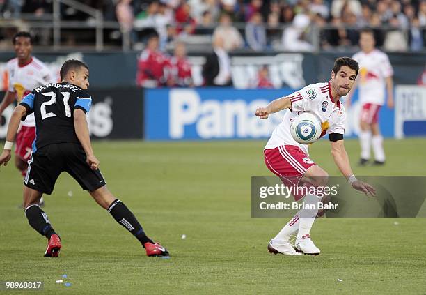 Juan Pablo Angel of the New York Red Bulls plays the ball as he is defended by Jason Hernandez of the San Jose Earthquakes on May 8, 2010 at Buck...