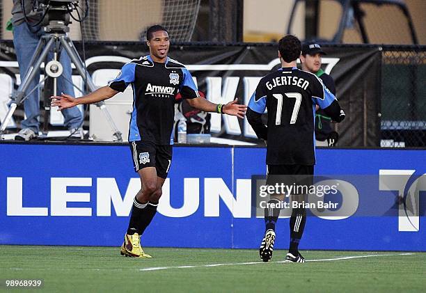 Ryan Johnson of the San Jose Earthquakes celebrates his goal against the New York Red Bulls with Joey Gjertsen on May 8, 2010 at Buck Shaw Stadium in...