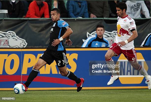 Jason Hernandez of the San Jose Earthquakes races down the sideline to take the ball away from Juan Pablo Angel of the New York Red Bulls on May 8,...