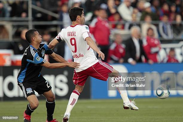 Jason Hernandez of the San Jose Earthquakes tries to fend off Juan Pablo Angel of the New York Red Bulls on May 8, 2010 at Buck Shaw Stadium in Santa...