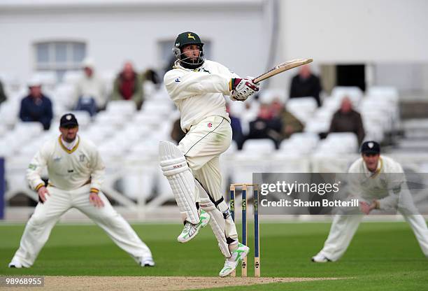 Hashim Amla of Nottinghamshire plays a shot during the LV County Championship match between Nottinghamshire and Durham at Trent Bridge on May 11,...