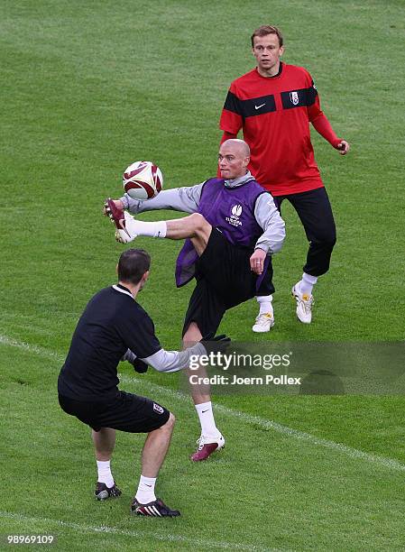 Paul Konchesky controls the ball during the Fulham training session ahead of the UEFA Europa League final match against Atletico Madrid at HSH...