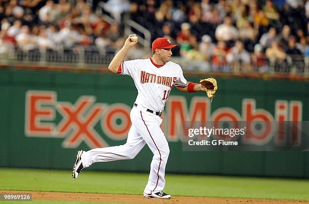 Ryan Zimmerman of the Washington Nationals throws the ball to first base against the Atlanta Braves at Nationals Park on May 4, 2010 in Washington,...