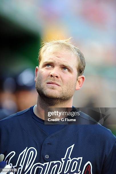 Brian McCann of the Atlanta Braves watches the game against the Washington Nationals at Nationals Park on May 4, 2010 in Washington, DC.