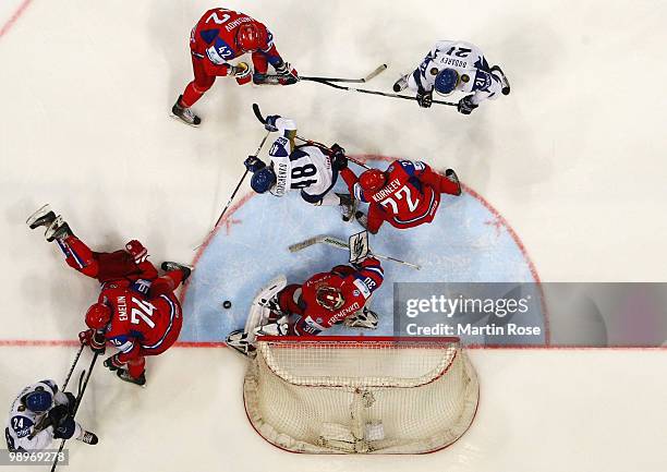 Alexander Emerenko, goalkeeper of Russia saves the shot of Roman Starchenko of Kazakhstan during the IIHF World Championship group A match between...