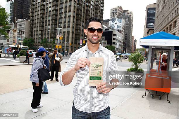 New York Mets Baseball player Angel Pagan promotes City Harvest's Skip Lunch Fight Hunger campaign at the Flatiron District North Pedestrian Plaza on...