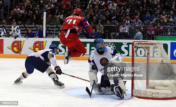 Ilya Kovalchuk of Russia jumps over goalkeeper Vitali Yeremeyev of Kazakhstan during the IIHF World Championship group A match between Russia and...