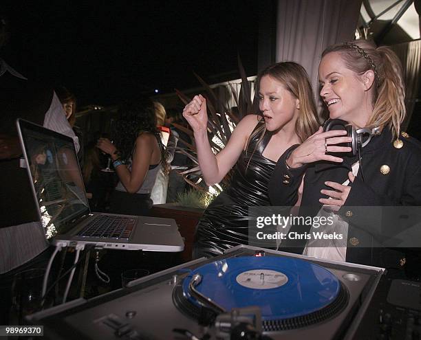 Actresses Devin Aoki and Taryn Manning attend a party for "Haute & Bothered" Season 2 hosted by LG Mobile at the Thompson Hotel on May 10, 2010 in...