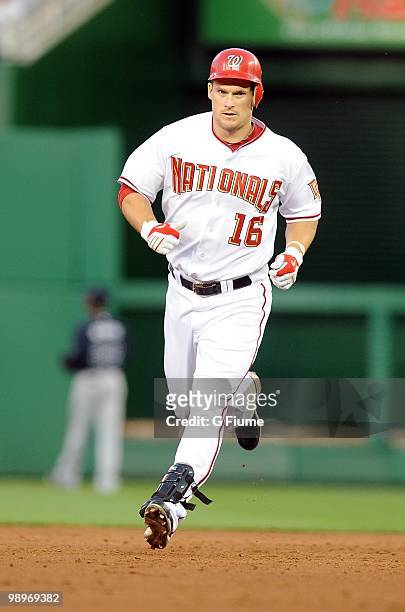 Josh Willingham of the Washington Nationals rounds the bases after hitting a home run against the Atlanta Braves at Nationals Park on May 4, 2010 in...