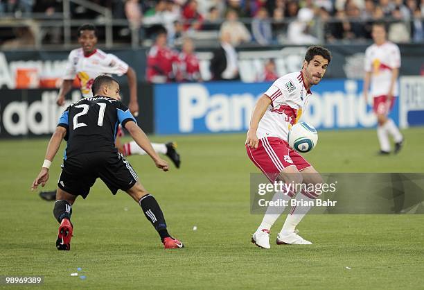 Juan Pablo Angel of the New York Red Bulls plays the ball as he is defended by Jason Hernandez of the San Jose Earthquakes on May 8, 2010 at Buck...