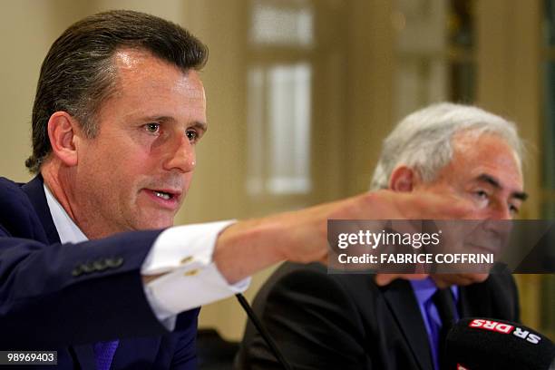 Swiss National Bank chairman Philipp Hildebrand and International Monetary Fund Managing-Director Dominique Strauss-Kahn attend a press conference...