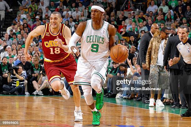 Rajon Rondo of the Boston Celtics drives the ball up court followed by Anthony Parker of the Cleveland Cavaliers in Game Three of the Eastern...