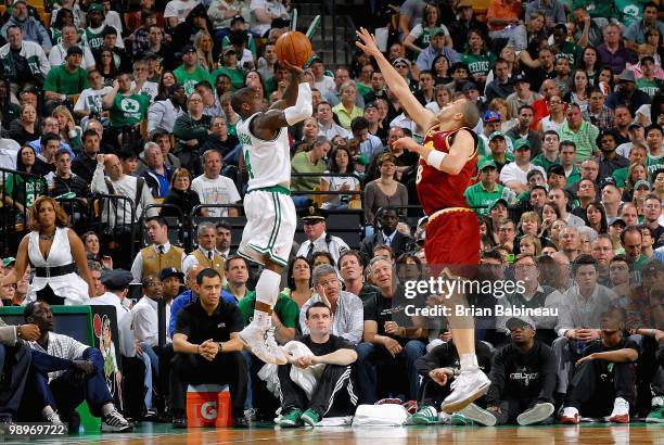 Nate Robinson of the Boston Celtics shoots over Anthony Parker of the Cleveland Cavaliers in Game Three of the Eastern Conference Semifinals during...