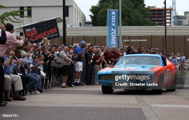 Richard Petty drives his car to the NASCAR Hall of Fame Grand Opening at the NASCAR Hall of Fame on May 11, 2010 in Charlotte, North Carolina.