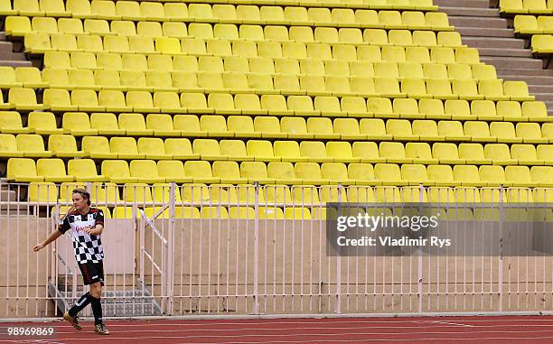 Nico Rosberg of Germany and Mercedes GP warms up ahead the football charity match between the Monaco star team and the team of formula one driver...