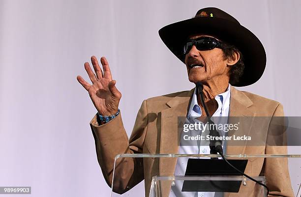 Richard Petty speaks to the crowd during the NASCAR Hall of Fame Grand Opening at the NASCAR Hall of Fame on May 11, 2010 in Charlotte, North...