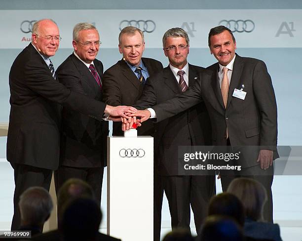 Charles Picque, president of the Brussels Capital Region, from left, Martin Winterkorn, chief executive officer of Volkswagen AG, Yves Leterme,...