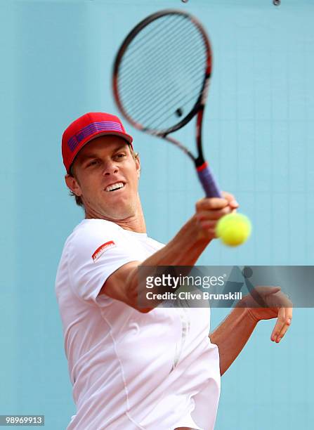 Sam Querrey of the USA plays a forehand against Daniel Munoz-De La Nava of Spain in their first round match during the Mutua Madrilena Madrid Open...
