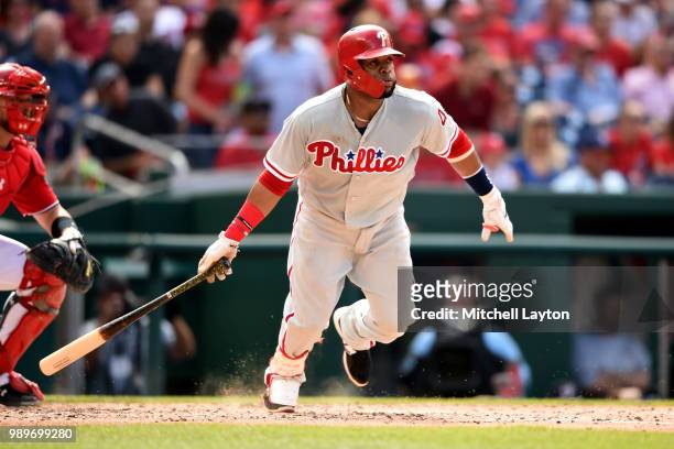 Carlos Santana of the Philadelphia Phillies takes a swing during a baseball game against the Washington Nationals at Nationals Park on June 23, 2018...