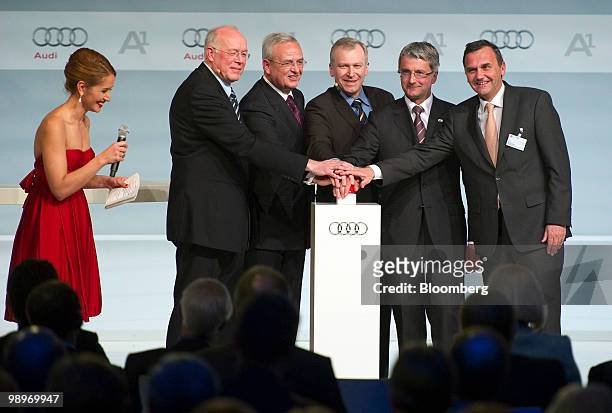 Charles Picque, president of the Brussels Capital Region, from left, Martin Winterkorn, chief executive officer of Volkswagen AG, Yves Leterme...