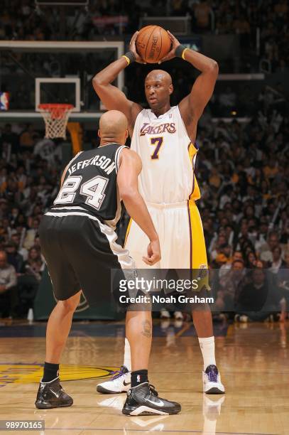 Lamar Odom of the Los Angeles Lakers looks to pass the ball against Richard Jefferson of the San Antonio Spurs at Staples Center on April 4, 2010 in...