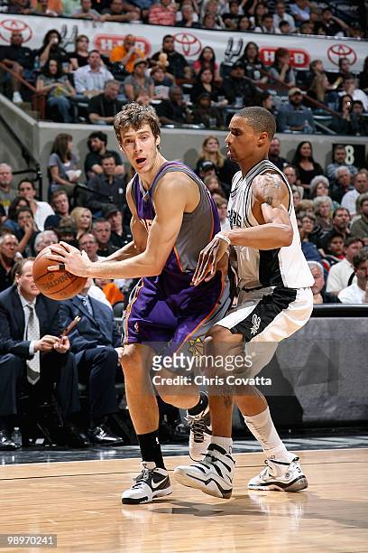 Goran Dragic of the Phoenix Suns goes to the basket past George Hill of the San Antonio Spurs in Game Four of the Western Conference Semifinals...