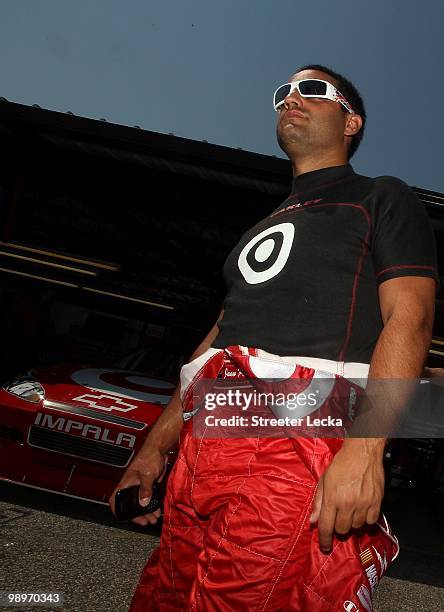 Juan Pablo Montoya, driver of the Target Chevrolet, looks on in the garage area during practice for the NASCAR Sprint Cup series SHOWTIME Southern...