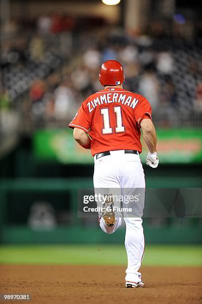 Ryan Zimmerman of the Washington Nationals rounds the bases after hitting a home run against the Florida Marlins at Nationals Park on May 7, 2010 in...