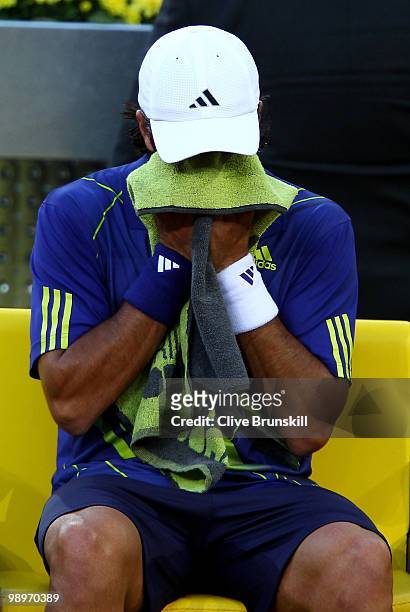 Fernando Verdasco of Spain shows his dejection against Ivo Karlovic of Croatia in their second round match during the Mutua Madrilena Madrid Open...