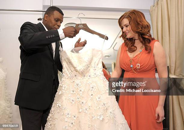 Wedding expert Mark Ingram helps actress and Jenny Craig celebrity client Sara Rue look at dresses during Rue's 40 pound weight loss milestone...