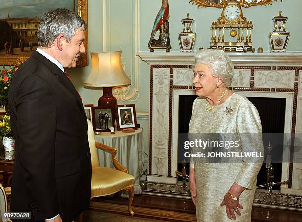 British Queen Elizabeth greets Labour Party Leader Gordon Brown, for an audience at which he tendered his resignation as Prime Minister, at...