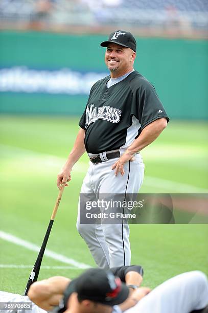 Manager Fredi Gonzalez of the Florida Marlins talks with players before the game against the Washington Nationals at Nationals Park on May 7, 2010 in...