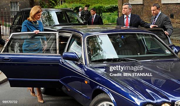 Leader of Britain's ruling Labour Party, Gordon Brown and his wife Sarah, prepare to visit Queen Elizabeth II after announcing his resignation as...