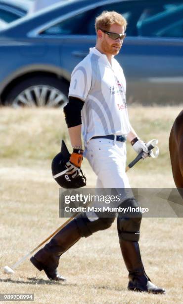 Prince Harry, Duke of Sussex takes part in the Audi Polo Challenge at Coworth Park Polo Club on June 30, 2018 in Ascot, England.