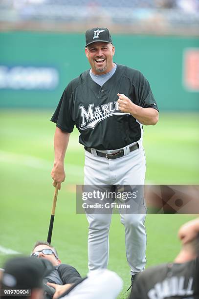 Manager Fredi Gonzalez of the Florida Marlins talks with players before the game against the Washington Nationals at Nationals Park on May 7, 2010 in...