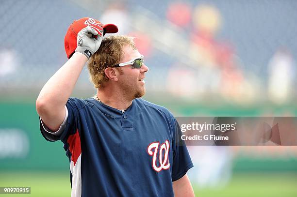 Adam Dunn of the Washington Nationals warms up before the game against the Florida Marlins at Nationals Park on May 7, 2010 in Washington, DC.