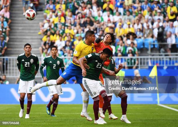 Guillermo Ochoa of Mexico punches the ball clear during the 2018 FIFA World Cup Russia Round of 16 match between Brazil and Mexico at Samara Arena on...