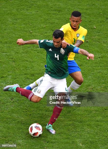 Rafael Marquez of Mexico is tackled Gabriel Jesus of Brazil during the 2018 FIFA World Cup Russia Round of 16 match between Brazil and Mexico at...