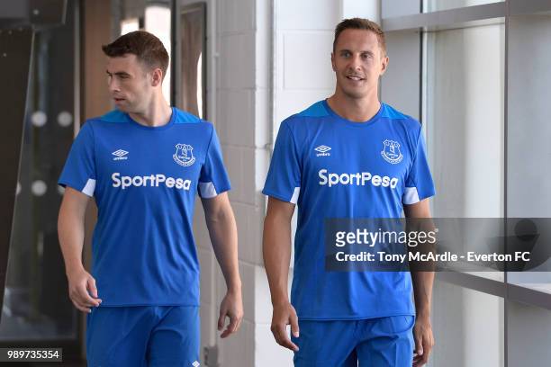 Theo Walcott and Phil Jagielka of Everton return for training at USM Finch Farm on July 2, 2018 in Halewood, England.