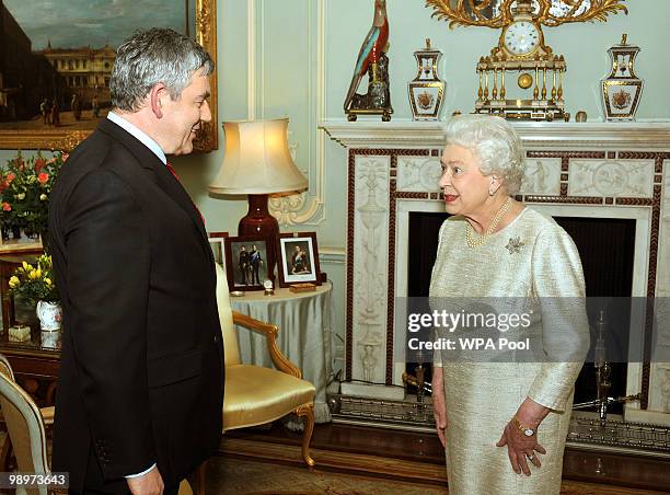 Queen Elizabeth II greets Gordon Brown at Buckingham Palace for an audience at which he tendered his resignation as Prime Minister, on May 11, 2010...